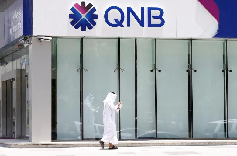A man walks past a branch of Qatar National Bank (QNB) in Riyadh, Saudi Arabia, June 5, 2017. (REUTERS)