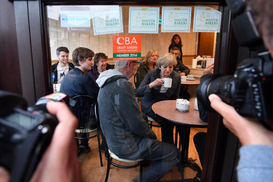 Britain's Prime Minister Theresa May visits a bakery in Fleetwood on June 6, 2017. (Reuters)