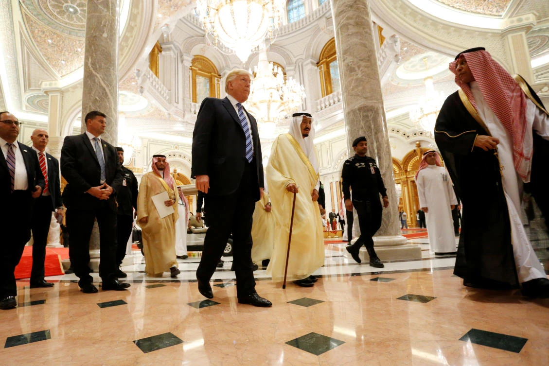 US President Donald Trump (center L) walks with Saudi Arabia’s King Salman bin Abdulaziz Al Saud (center R) to deliver remarks to the Arab Islamic American Summit in Riyadh, Saudi Arabia. (REUTERS)