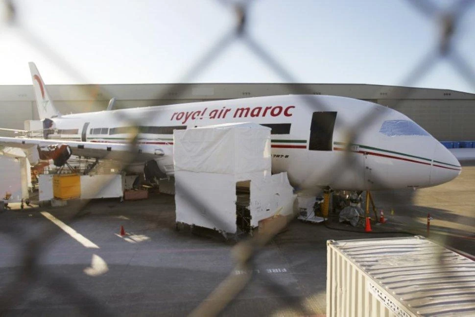 A 787 Dreamliner jet painted in Royal Air Maroc livery, sits idle on the tarmac parking at Paine Field in Everett, Washington, January 17, 2013. (REUTERS)