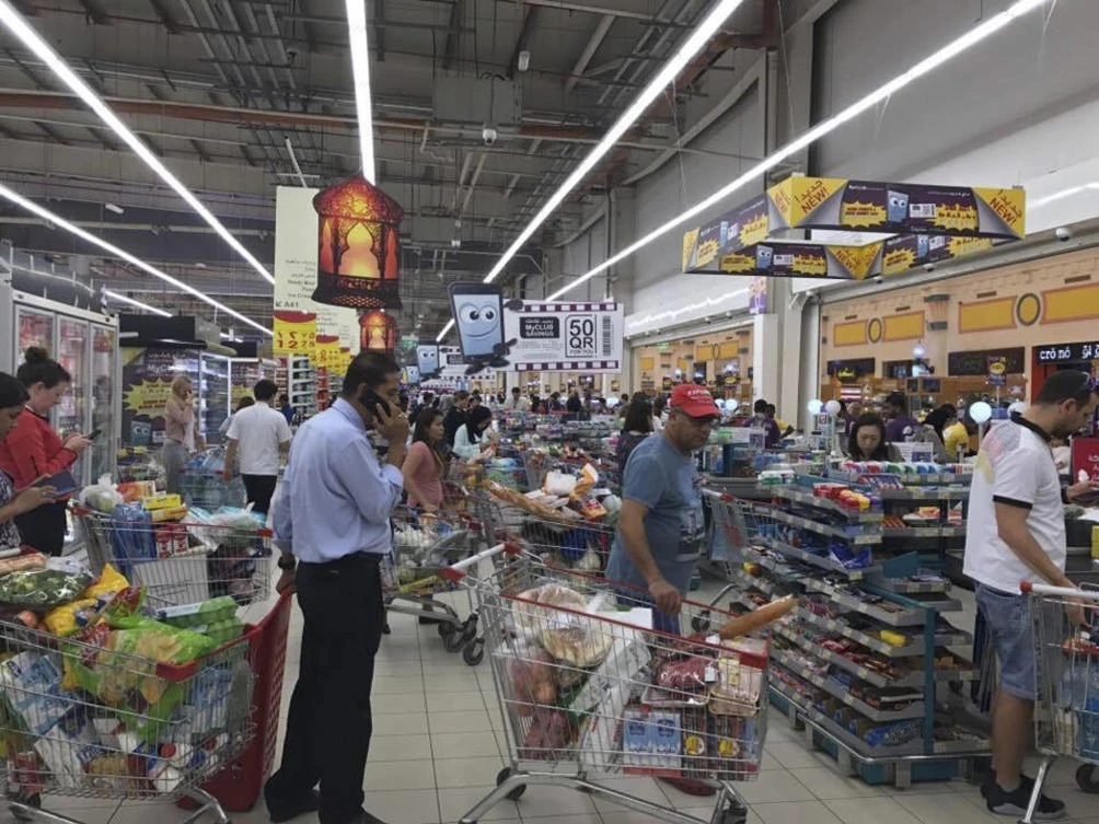 Shoppers stock up on supplies at a supermarket in Doha, Qatar. (AP)