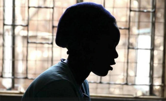 FILE PHOTO - A girl who trades sex for basic needs speaks during an interview with the Thomson Reuters Foundation at a health clinic within the Korogocho slum, in Kenya's capital Nairobi, February 16, 2015. REUTERS/Katy Migiro
