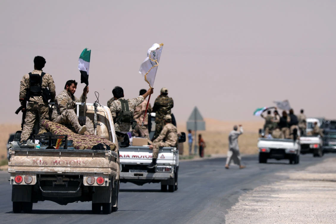 Syrian Democratic Forces (SDF) fighters on their way to Raqqa, Syria. (Reuters)