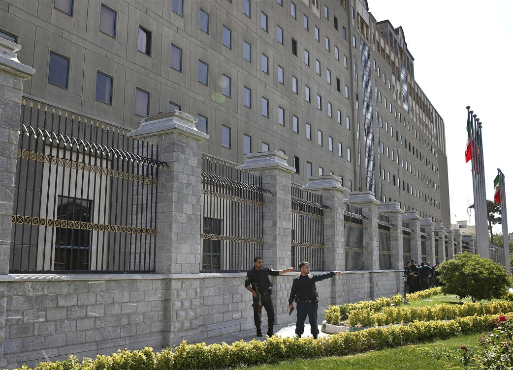 Police patrol outside Iran's parliament building after an assault by several attackers that was claimed by Daesh, in Tehran, Iran. (AP)