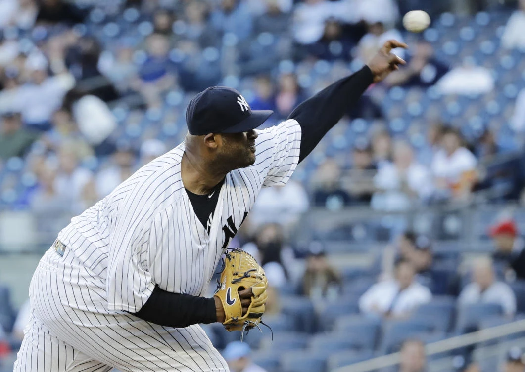 New York Yankees' CC Sabathia delivers a pitch during the first inning of the team's baseball game against the Boston Red Sox on Wednesday in New York. (AP)
