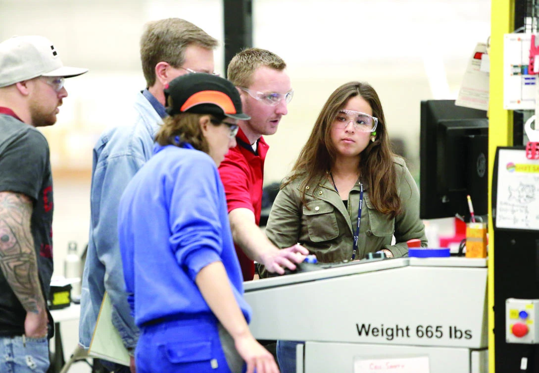 Employees operate a machine at Boeing's production facility in Everett, Washington. (Reuters)