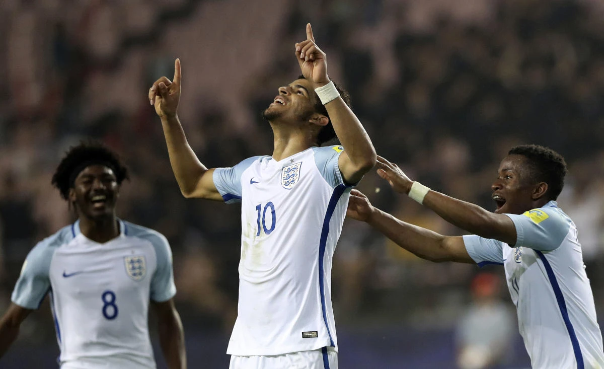 England's Dominic Solanke, center, celebrates his goal against Italy with teammates Ainsley Maitland-Niles, left, and Ademola Lookman during their semifinal soccer match in the FIFA U-20 World Cup Korea 2017 at Jeonju World Cup Stadium in Jeonju, South Korea, on Thursday. (AP)