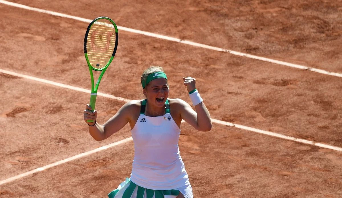 Latvia's Jelena Ostapenko celebrates after winning her semifinal tennis match against Switzerland's Timea Bacsinszky at the Roland Garros 2017 French Open on Thursday in Paris. (AFP)