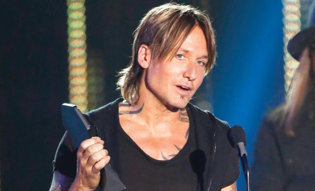 Keith Urban accepts the award for video of the year in Nashville, Tennessee on Wednesday. (AP)