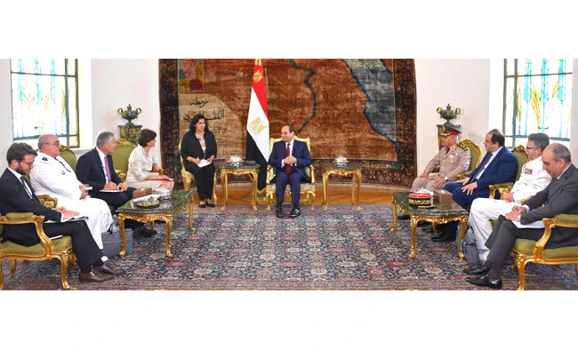 A handout picture released by the Egyptian Presidency shows Egyptian President Abdel Fattah El-Sisi (C) meeting with French Minister of the French Armed Forces, Sylvie Goulard (3L) and officials at the presidential place in Cairo on June 5, 2017. (AFP)