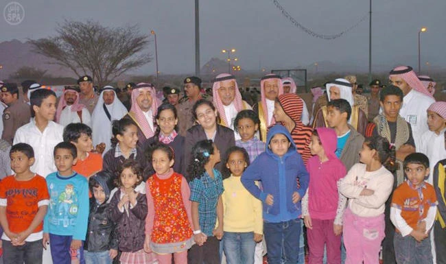 File photo of Saudi officials visiting children at an orphanage. (SPA)