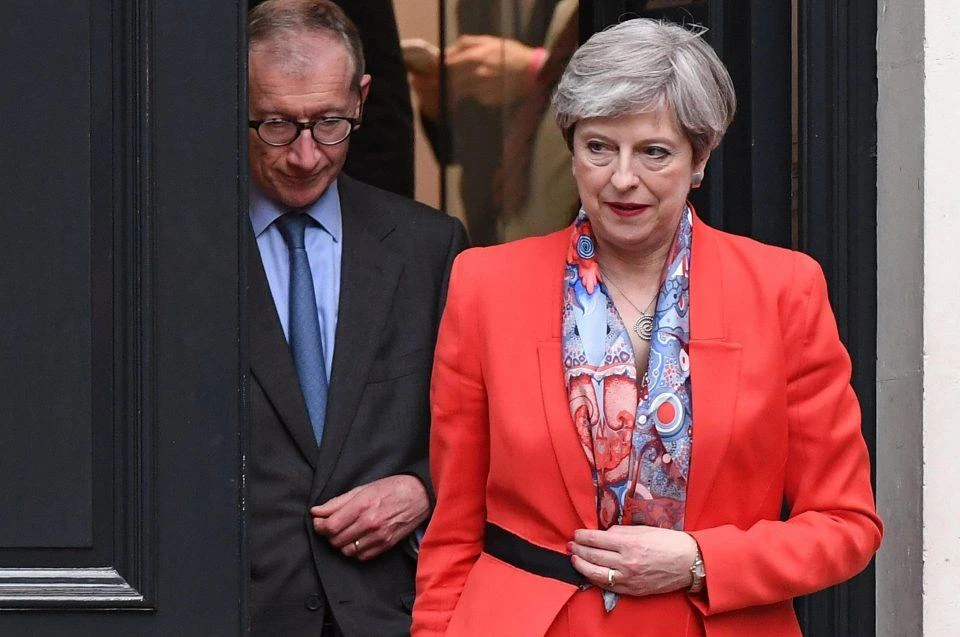UK PM May to seek Queen's permission to form a government(AFP)