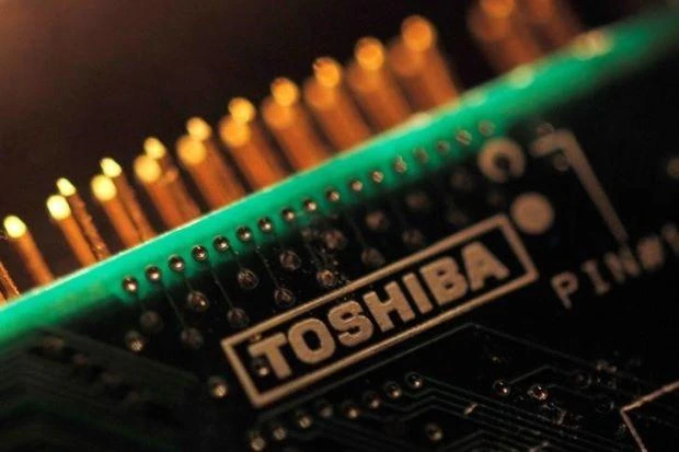 Bain in talks with Japan fund on bid for Toshiba chip unit.(AFP)