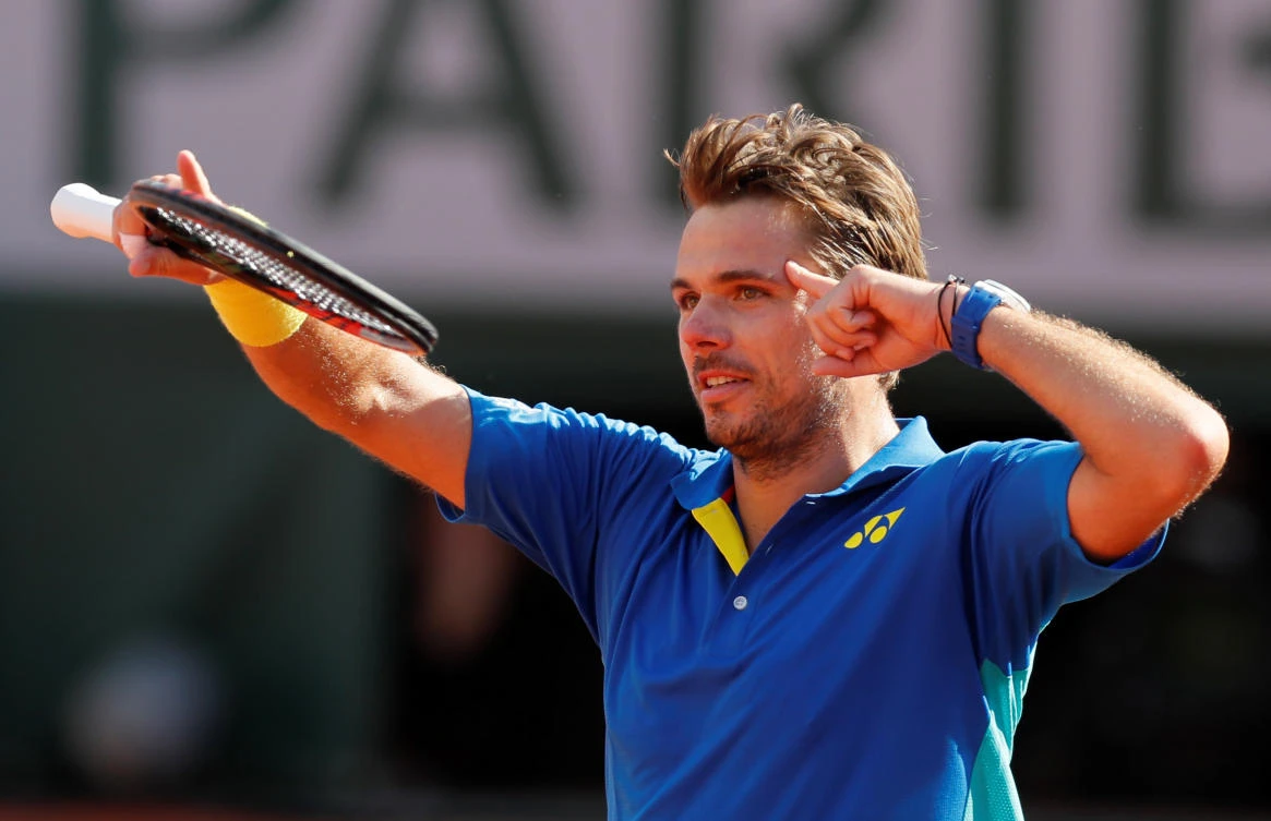 Stan Wawrinka celebrates winning his semifinal match against Great Andy Murray in the French Open, at Roland Garros, on Friday. (Reuters)