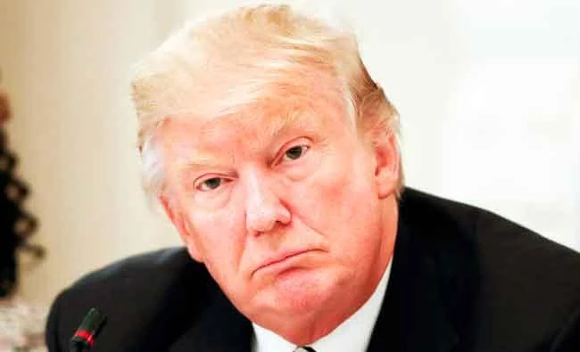 President Donald Trump listens during his meeting with U.S. Mayors and Governors for an Infrastructure Summit in the State Dinning Room of the White House in Washington, on Thursday. (AP)