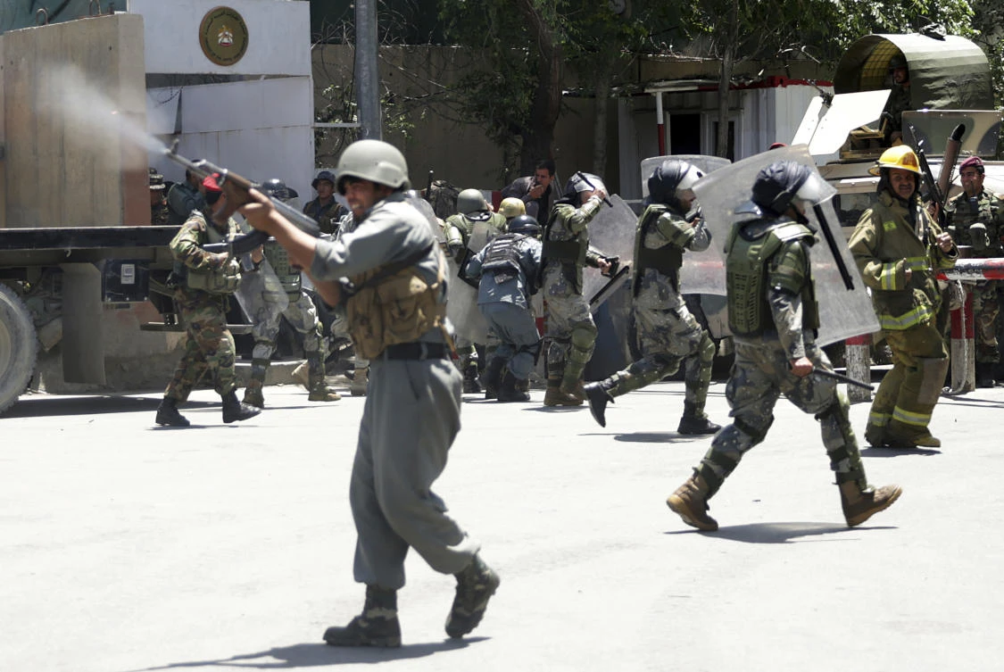 Police forces run as protesters throw stones in Kabul, Afghanistan, Friday, Jun 2, 2017. Some 500 people are demonstrating in Kabul for better security in the Afghan capital in the wake of a powerful truck bomb attack that killed 90 people. (AP)