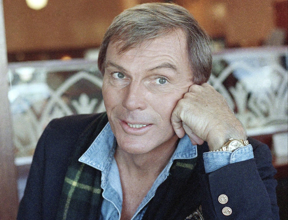 FILE - In this Dec. 11, 1985 file photo, Adam West poses for a photo in Los Angeles. On Saturday, June 10, 2017, his family said the actor, who portrayed Batman in a 1960s TV series, has died at age 88. (AP)