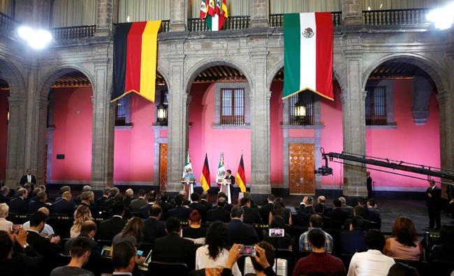 Germany’s Chancellor Angela Merkel and Mexico’s President Enrique Pena Nieto attend a news conference at National Palace in Mexico City. (Reuters)