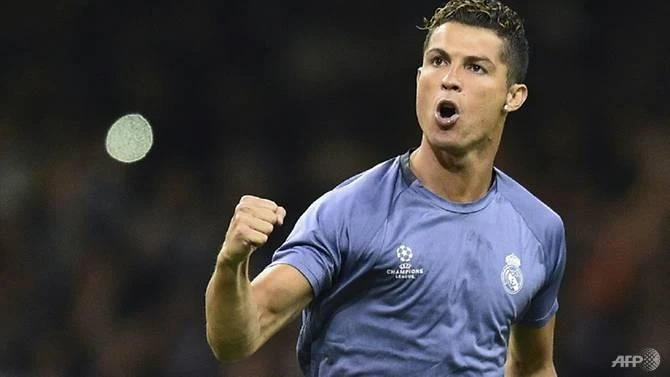 Real Madrid striker Cristiano Ronaldo has never confirmed that his first son was born to a surrogate mother. (AFP)
