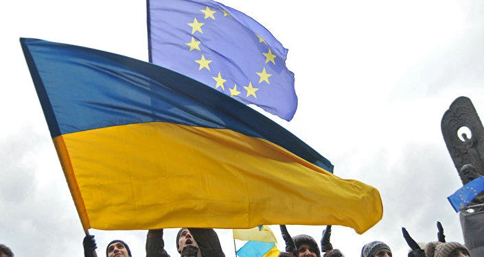 Ukrainians cheer on first day of visa-free EU travel.(AFP)