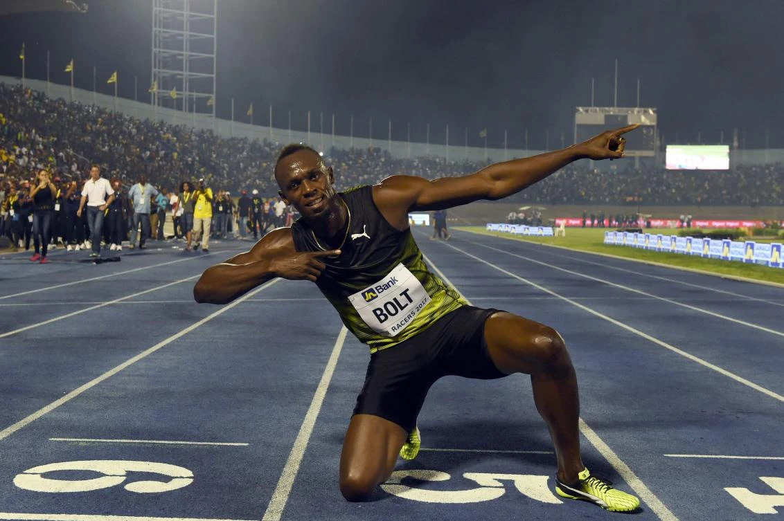 Usain Bolt of Jamaica celebrates after winning 100m "Salute to a Legend " race during the Racers Grand Prix at the national stadium in Kingston, Jamaica, on Saturday. (AFP)