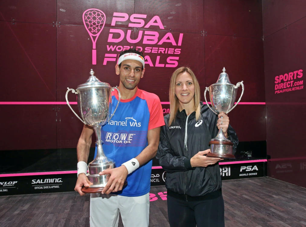 Mohamed Elshorbagy and Laura Massaro with their trophies after winning the men's and women's titles respectively in the PSA Dubai World Series Finals. (AN photo)