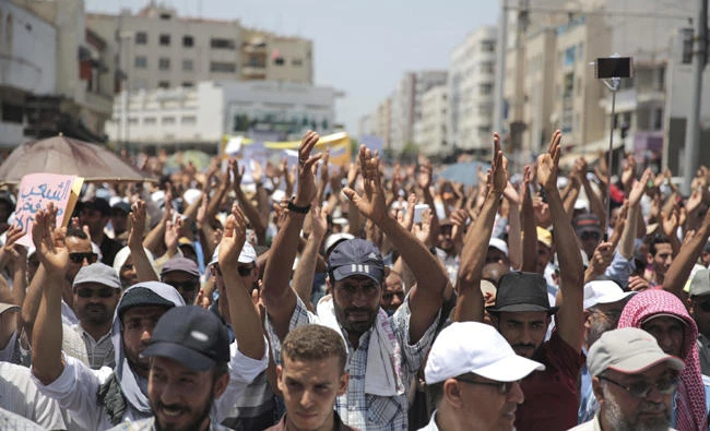 Thousands of protesters take to the streets against government corruption and official abuse of power in Rabat, Morocco, on Sunday. (AP Photo/Mosa'ab Elshamy)