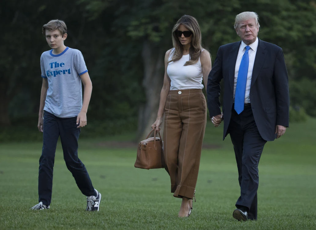 President Donald Trump, first lady Melania Trump, and their son and Barron Trump. (AP Photo/Carolyn Kaster)