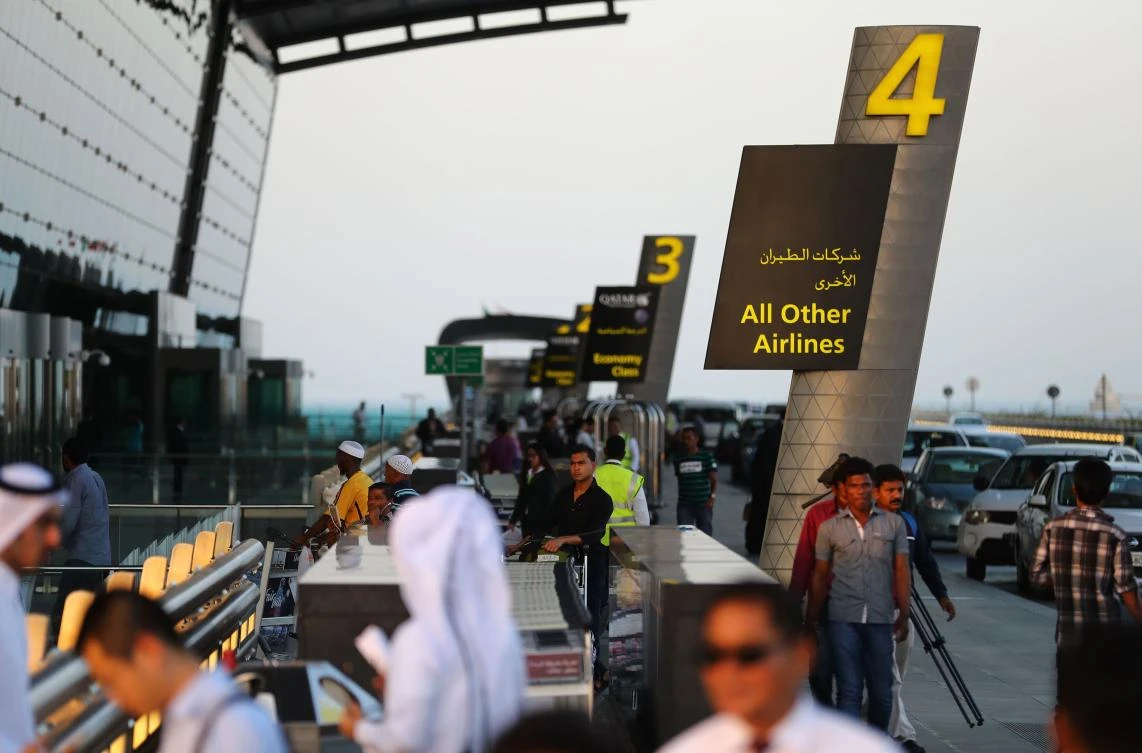 A picture of the entrance to a terminal hall at the Hamad International Airport in Doha, Qatar, on Monday. Eritrea has thrown its support behind Saudi Arabia, the UAE, Bahrain and Egypt, which have suspended ties with Qatar over the emirate's alleged support for extremists, banning all flights to and from the capital Doha and shutting down the offices of the country's national carrier. (AFP / KARIM JAAFAR)