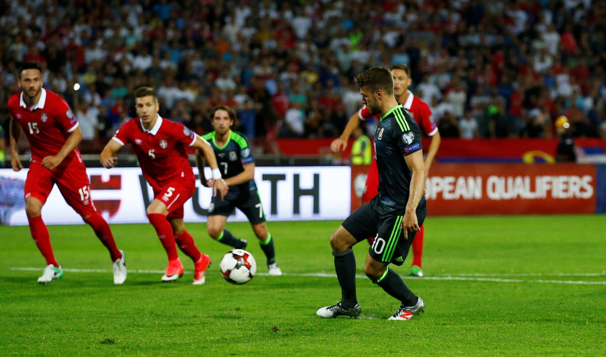 Wales' Aaron Ramsey scores their first goal from the penalty spot Sunday during the 2018 World Cup Qualifying European Zone Group D match between Serbia and Wales at Rajko Mitic Stadium in Belgrade, Serbia. (Reuters)