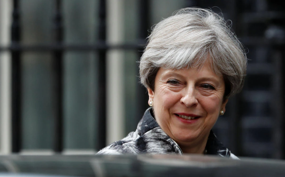Britain's Prime Minister Theresa May leaves Downing Street in London, June 12, 2017. (Reuters)