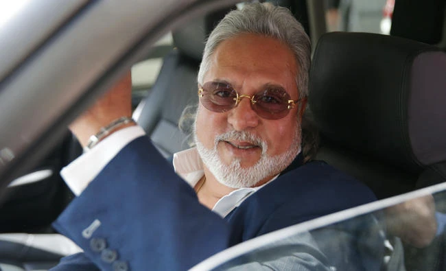 Indian tycoon Vijay Mallya drives away from court in central London on Tuesday. (AFP)