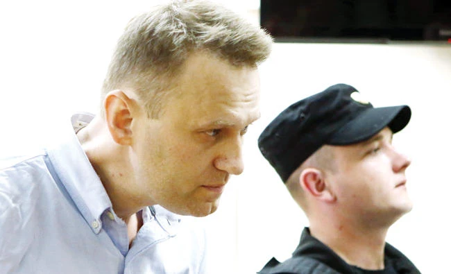 Russian opposition leader Alexei Navalny attends a hearing at a court in Moscow on Tuesday. (Reuters)