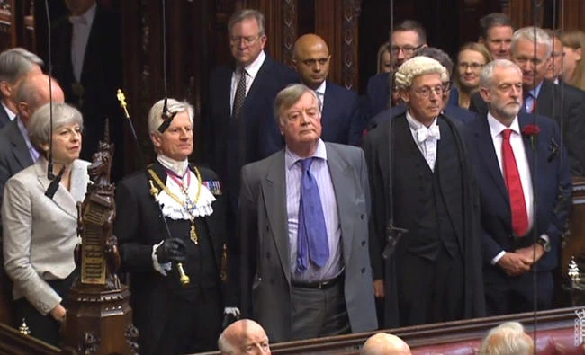 From left: Britain's Prime Minister Theresa May, David Leakey, Gentleman Usher of the Black Rod, Father of the House Kenneth Clarke and leader of the opposition Labour leader Jeremy Corbyn take part in the swearing in ceremony in the House of Lords in central London on Tuesday during the process of starting a new Parliament. (AFP)