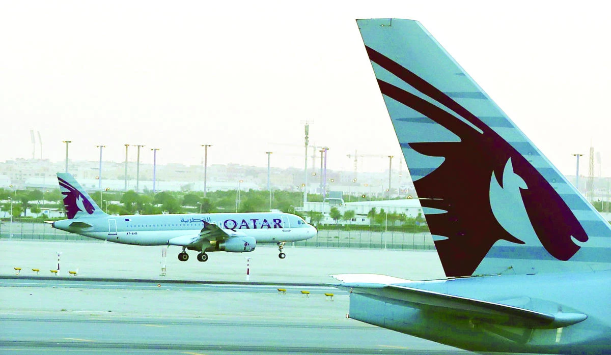 A Qatar Airways plane lands at Hamad International Airport in Doha. (AFP)