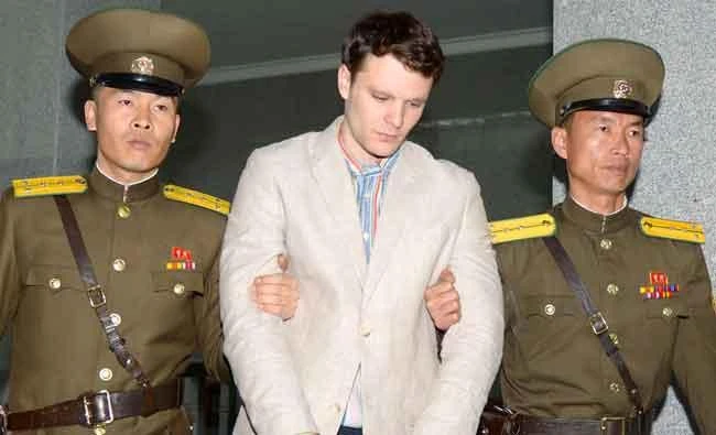 Otto Frederick Warmbier (C), a University of Virginia student who was detained in North Korea since early January, is taken to North Korea's top court in Pyongyang, North Korea, in this photo released by Kyodo on March 16, 2016. (Reuters)