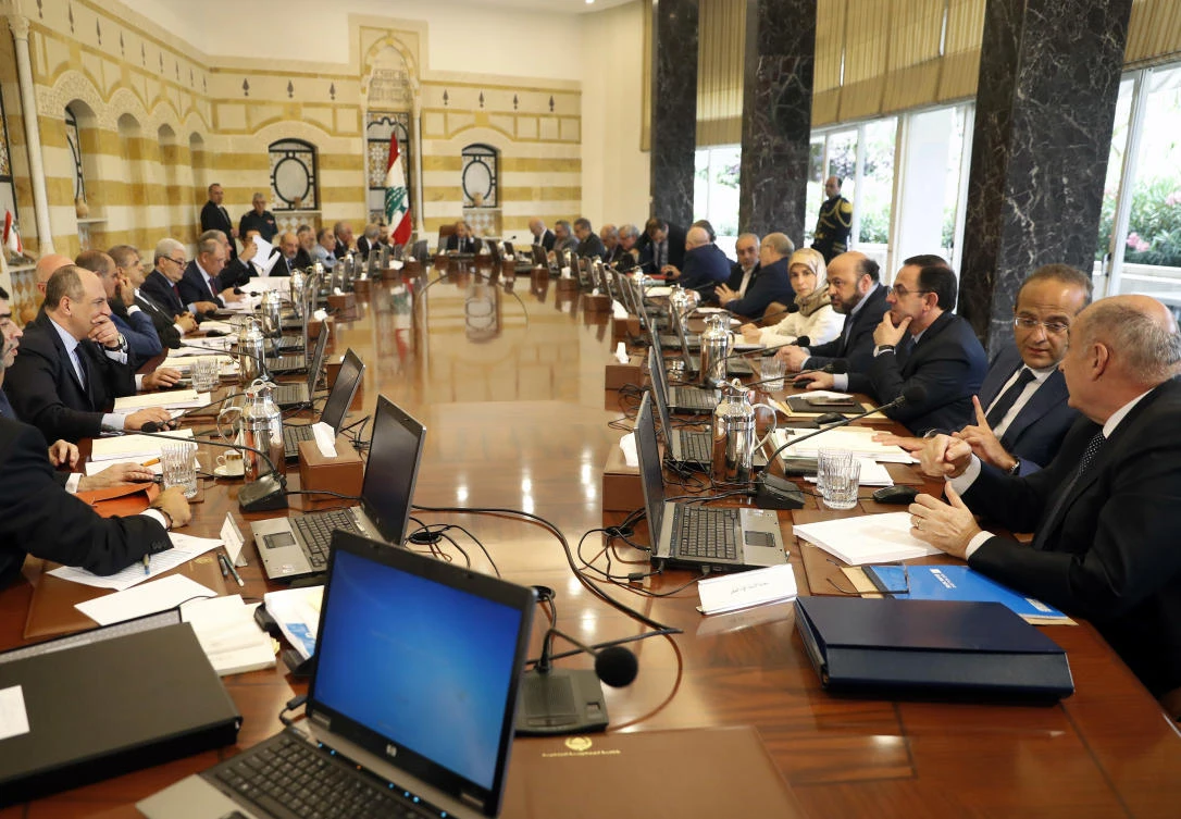 Lebanese ministers attend a cabinet meeting to approve the new electoral law, at the presidential palace, in Baabda area east of Beirut, Lebanon, Wednesday, June 14, 2017. The Lebanese Cabinet approved a new elections law and referred it to parliament for ratification, paving the way for parliamentary elections postponed twice over the past year. (AP Photo/Hussein Malla)