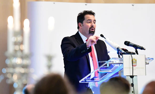 Secretary-general of the Central Council of Muslims in Germany Ayman Mazyek delivers a speech on behalf of the Ramadan ahead a fast-breaking Iftar-meal at the embassy of the United Arab Emirates in Berlin on June 13, 2017. Muslims in Germany are planning a “peace march” against terrorism over the weekend. (AFP)