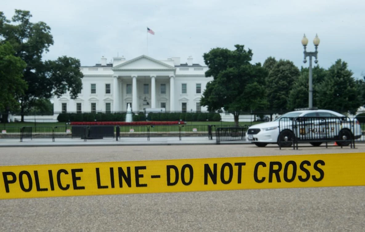 Police tape hangs along Pennsylvania Avenue across from the White House in Washington, DC, on Thursday, one day after House Majority Whip Steve Scalise was shot in nearby Alexandria, Virginia. (AFP)
