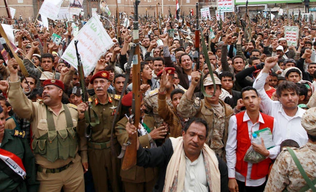 Iran-backed Houthis insurgents gather in Sanaa during a demonstration against the UN-recognized government of Yemeni President Abed Rabbo Mansour Hadi in March 2015. Gulf human rights organizations have asked the UN Human Rights Council (UNHRC) to help stop the “global terrorism led by the Iranian regime.”