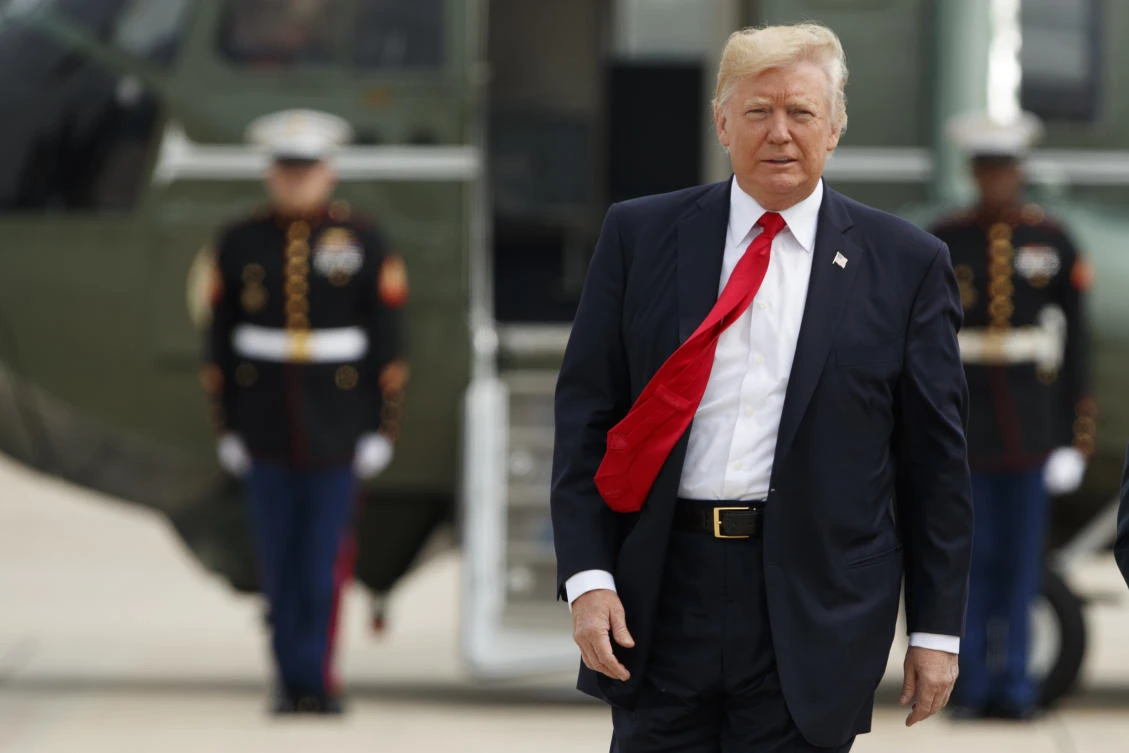 President Donald Trump walks from Marine One to board Air Force One for a trip to Miami to deliver a speech on Cuba policy, Friday, June 16, 2017, at Andrews Air Force Base, Maryland (AP)
