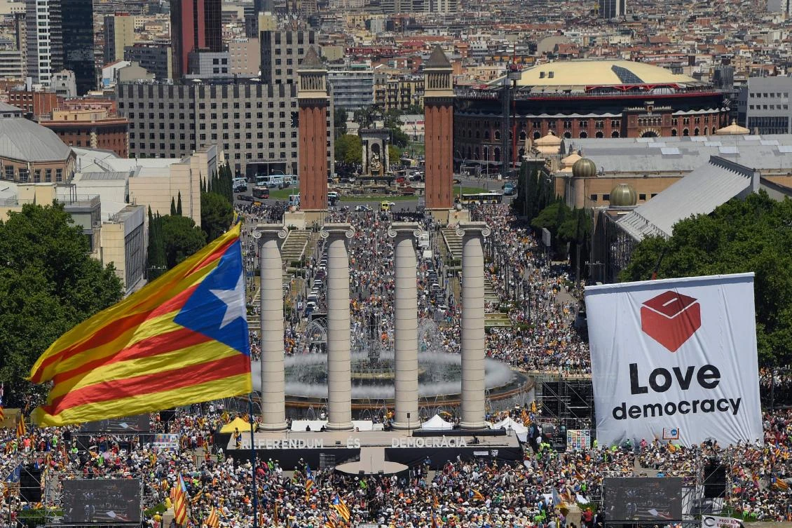 A Catalan pro-independence flag flutters as thousands of people take part in a recent demonstration in Barcelona in favor of Catalonia breaking away from Spain. (AFP)