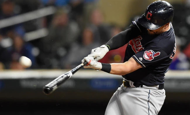 Lonnie Chisenhall of the Cleveland Indians hits a three-run home run against the Minnesota Twins during the sixth inning in game two of a doubleheader on Saturday at Target Field in Minneapolis, Minnesota. The Indians defeated the Twins 6-2. (AFP)