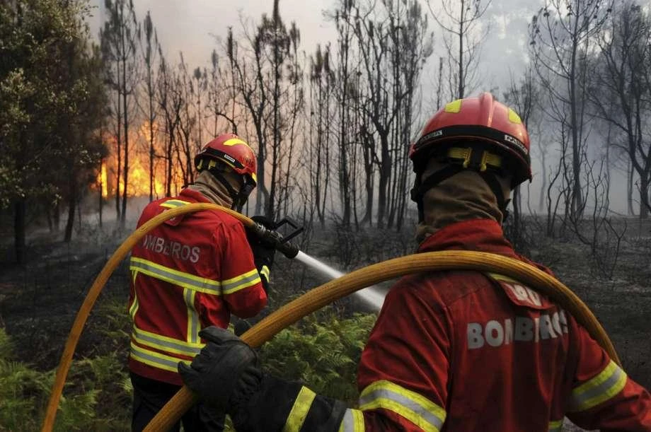 Firefighters battling Portugal fires. (AP)