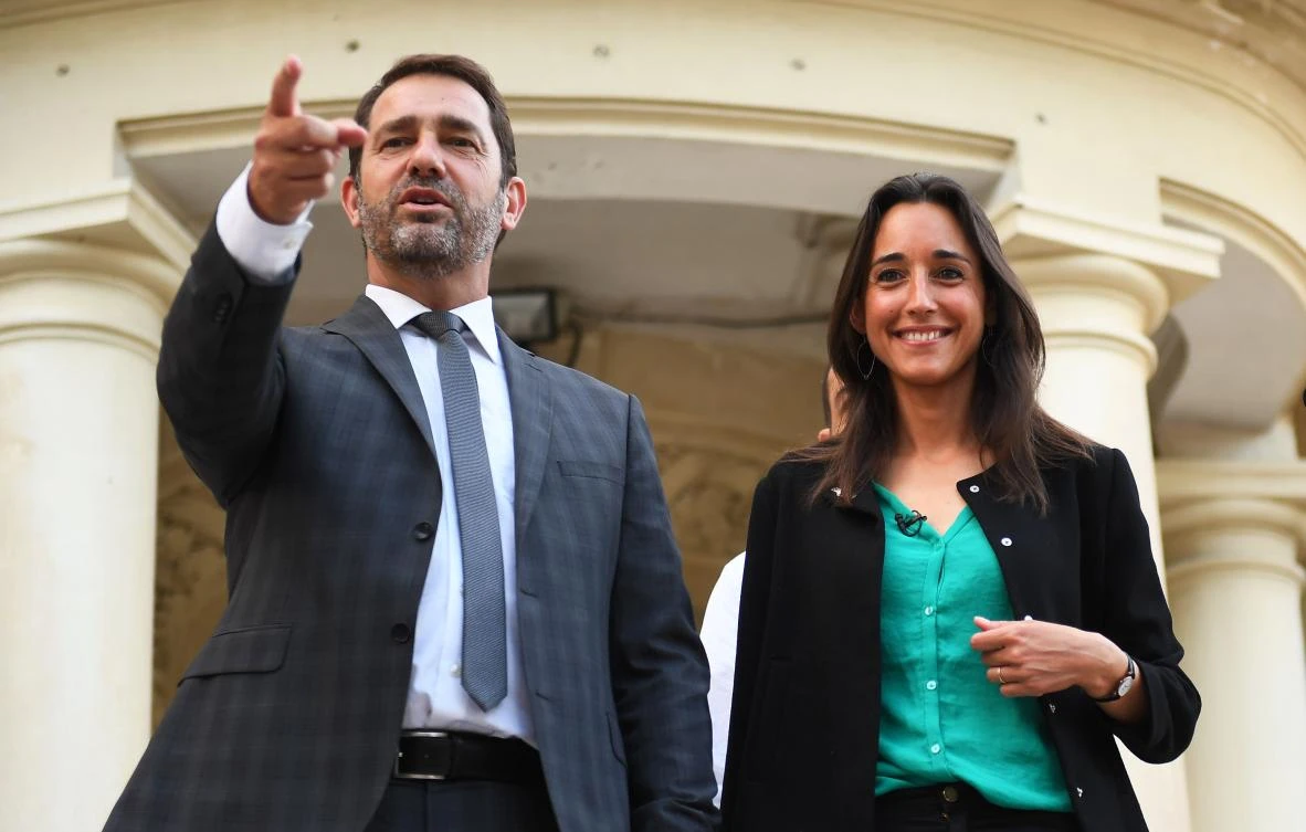 Christophe Castaner (L), French Minister of State for Relations with Parliament, government spokesperson and "La Republique En Marche" (LREM) party candidate in the second constituency of the Alpes-de-Haute-Provence for France's legislative elections, walks with Brune Poirson (R), LREM candidate in the 3rd district of the Vaucluse, during a campaign meeting on June 14, 2017, in Carpentras, southern France. France heads to the polls on June 18, 2017, for the second round of legislative elections, with Macron's year-old La Republique En Marche party and its allies tipped to clean up for the 577-member lower house of parliament, winning up to 445 seats. (AFP)