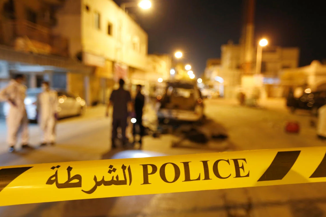 Police and crime scene officials are seen near scene where a blast killed one and seriously injured two police officers in the village of Diraz west of Manama, Bahrain, June 19, 2017. (REUTERS)