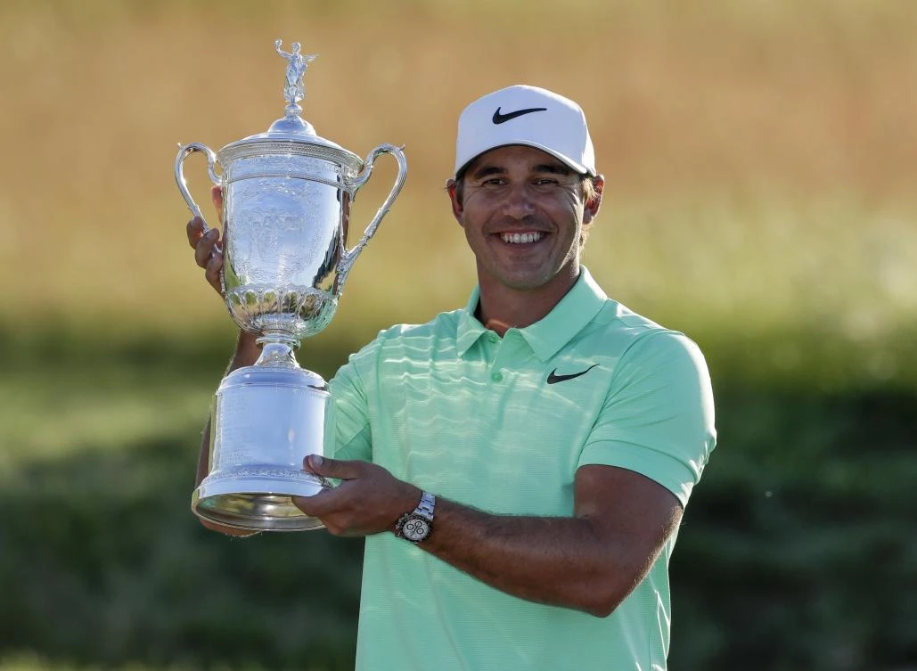 Brooks Koepka poses with the winning trophy after the US Open golf tournament Sunday at Erin Hills in Erin, Wis. on Sunday. (AP)