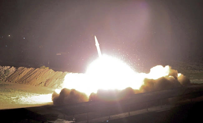 In this picture released by the Iranian state-run IRIB News Agency on Monday, a missile is fired from city of Kermanshah in western Iran targeting the Daesh group in Syria. (IRIB News Agency, Morteza Fakhrinejad via AP)
