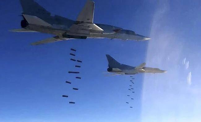 In this file photo provided on Jan. 23, 2017 by the Russian Defense Ministry Press Service, Tu-22M3 bombers strike Daesh targets around Deir Ezzor, eastern Syria. (Russian Defense Ministry Press Service via AP, File)