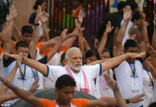 Yoga connecting world, says Modi as millions stretch and bend.(AFP)
